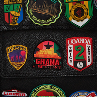 SPRAYGROUND® BACKPACK A.I. THE 54 (PATCHES OF AFRICA) CARGO BACKPACK