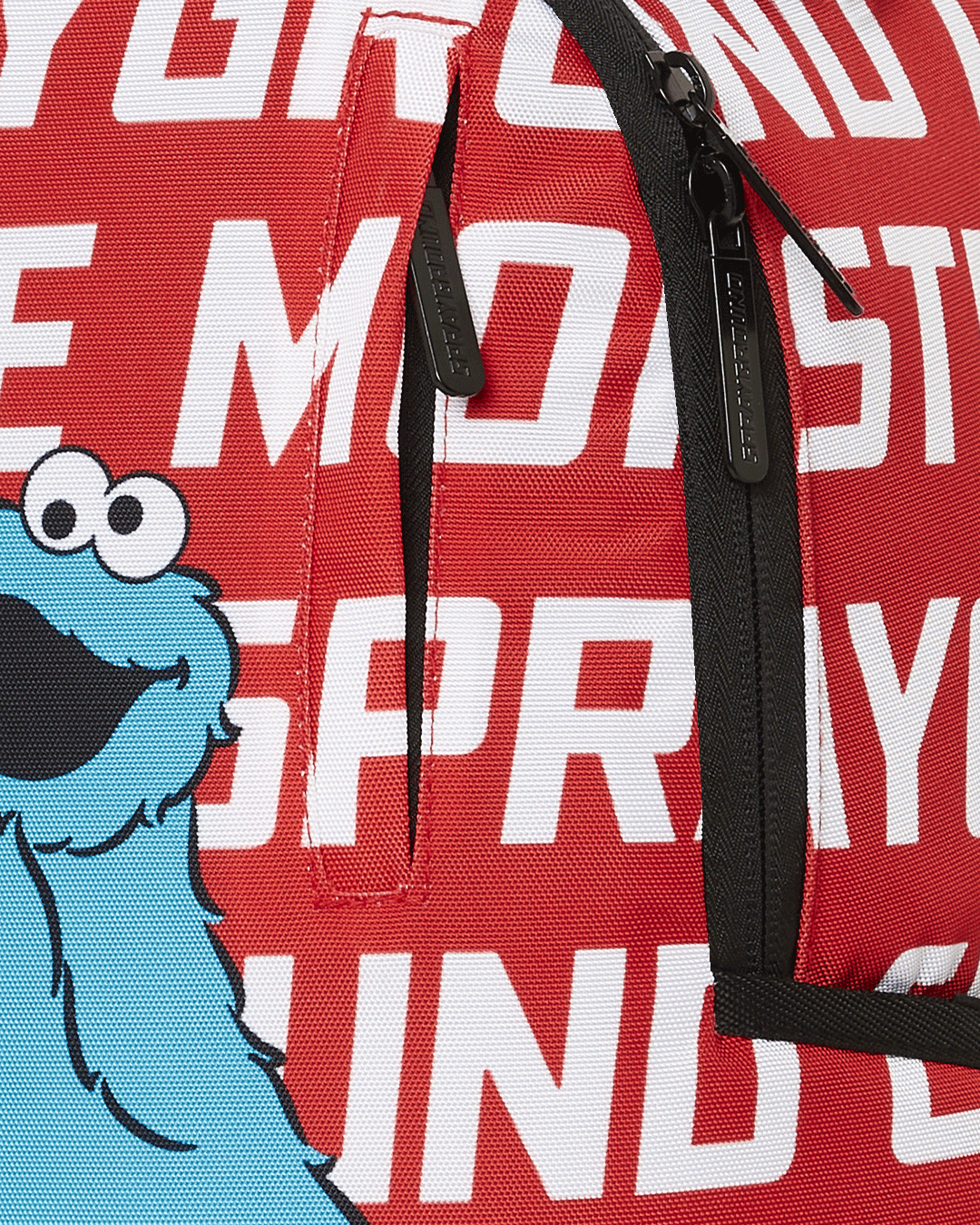 SPRAYGROUND® BACKPACK SESAME STREET COOKIE MONSTER SPRAYGROUND REPEAT DLXSR BACKPACK