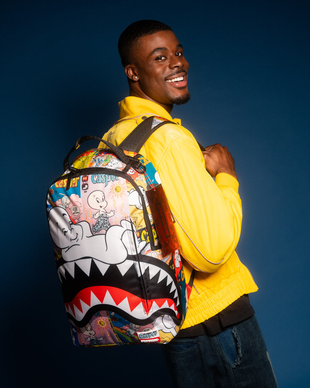 SPRAYGROUND® BACKPACK CASPER MAGAZINE ART DLXSR BACKPACK