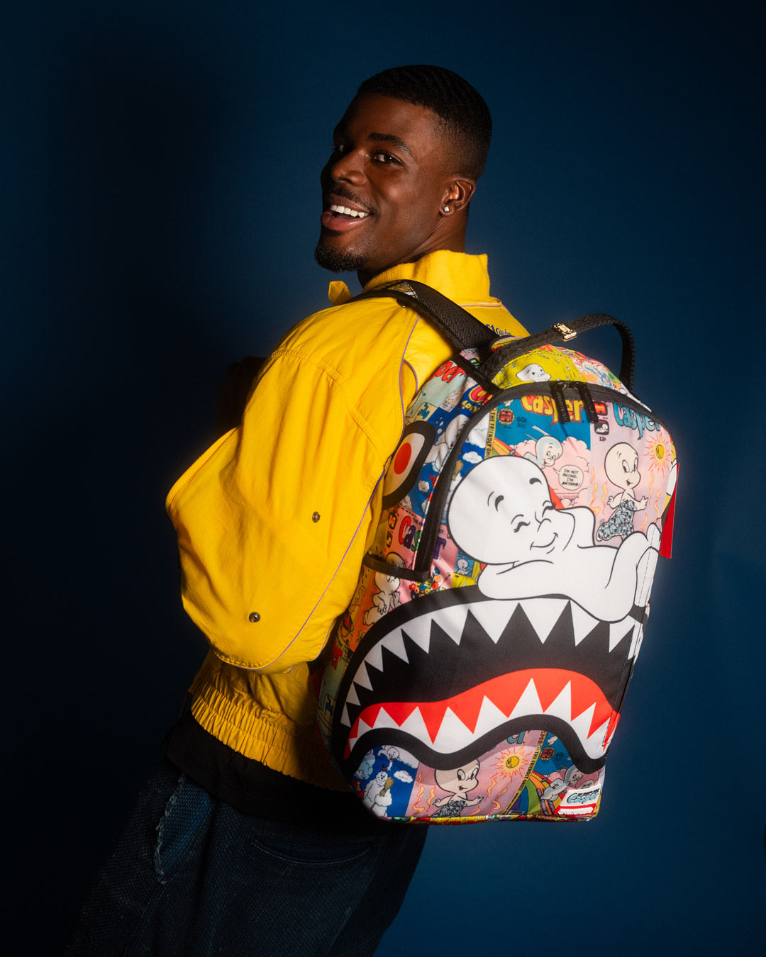 SPRAYGROUND® BACKPACK CASPER MAGAZINE ART DLXSR BACKPACK