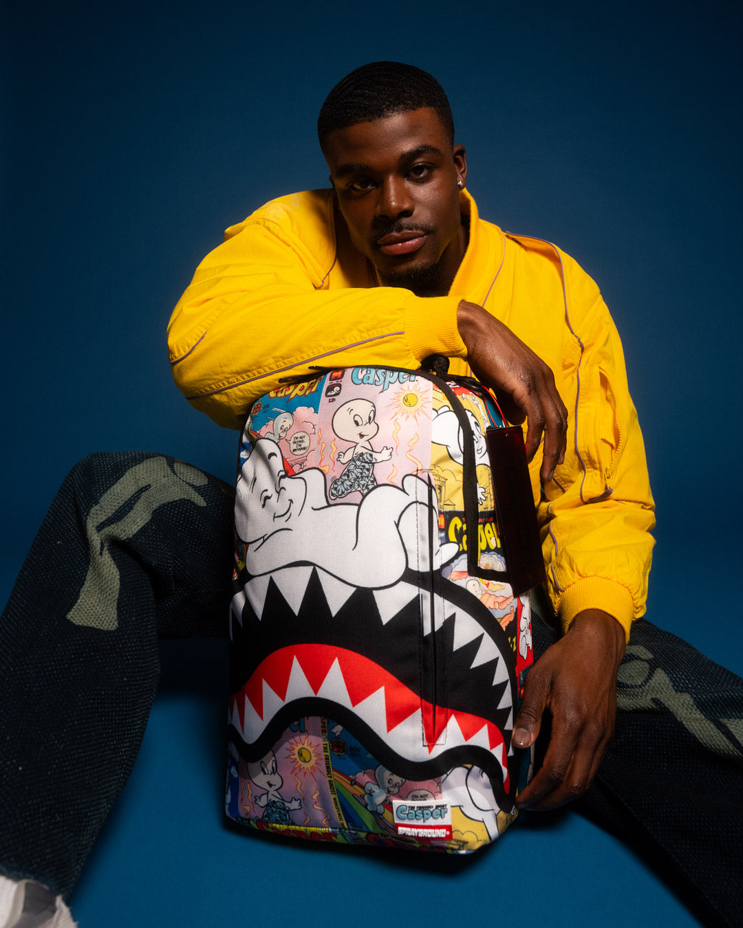 SPRAYGROUND® BACKPACK CASPER MAGAZINE ART DLXSR BACKPACK