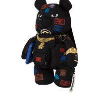 SPRAYGROUND® BACKPACK JAMES FIRST CLASS I GOT THESE STAMPS MONEYBEAR