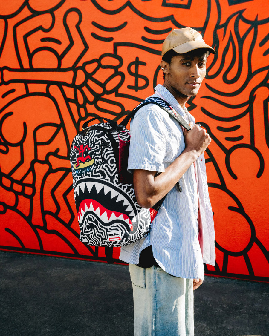 SPRAYGROUND® BACKPACK KEITH HARING SKATER GUY DLXSR BACKPACK