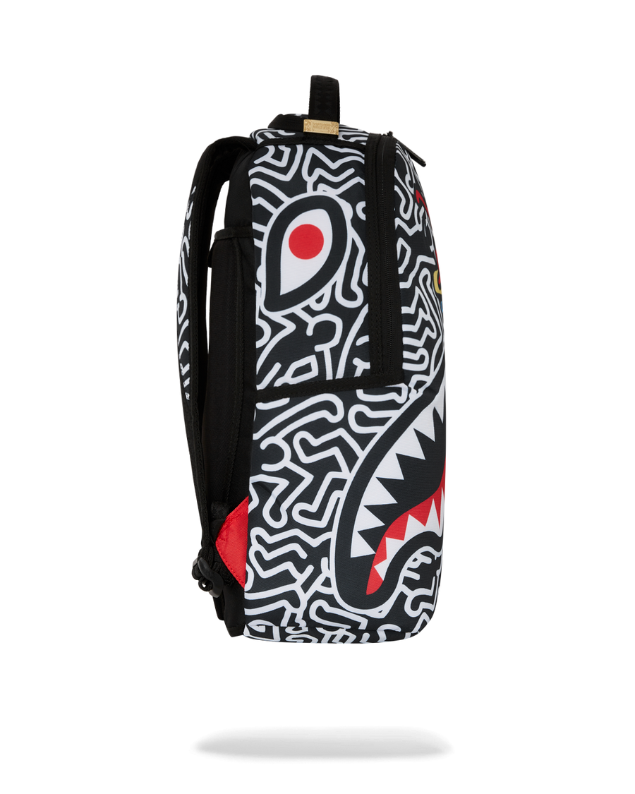 SPRAYGROUND® BACKPACK KEITH HARING SKATER GUY DLXSR BACKPACK