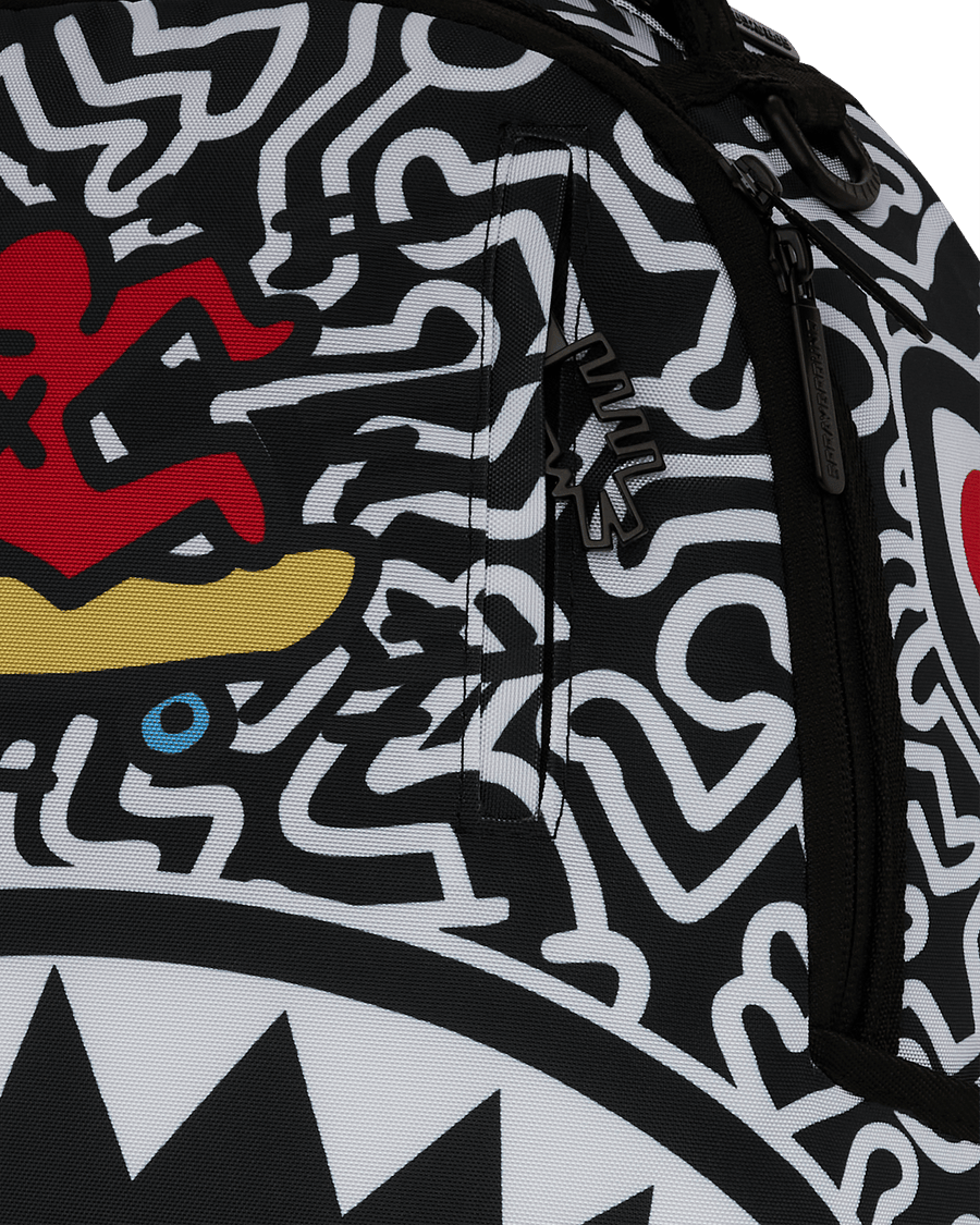 SPRAYGROUND® BACKPACK KEITH HARING SKATER GUY DLXSR BACKPACK