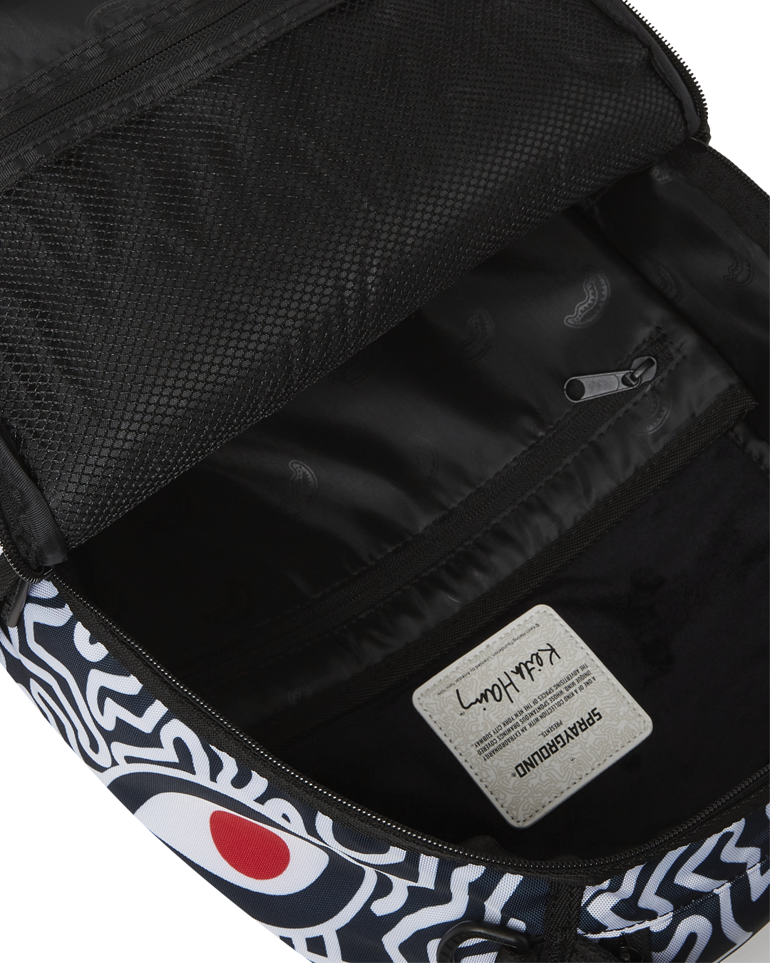 SPRAYGROUND® BACKPACK KEITH HARING SKATER GUY DLXSR BACKPACK