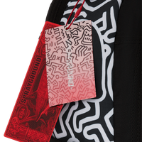 SPRAYGROUND® BACKPACK KEITH HARING SKATER GUY DLXSR BACKPACK