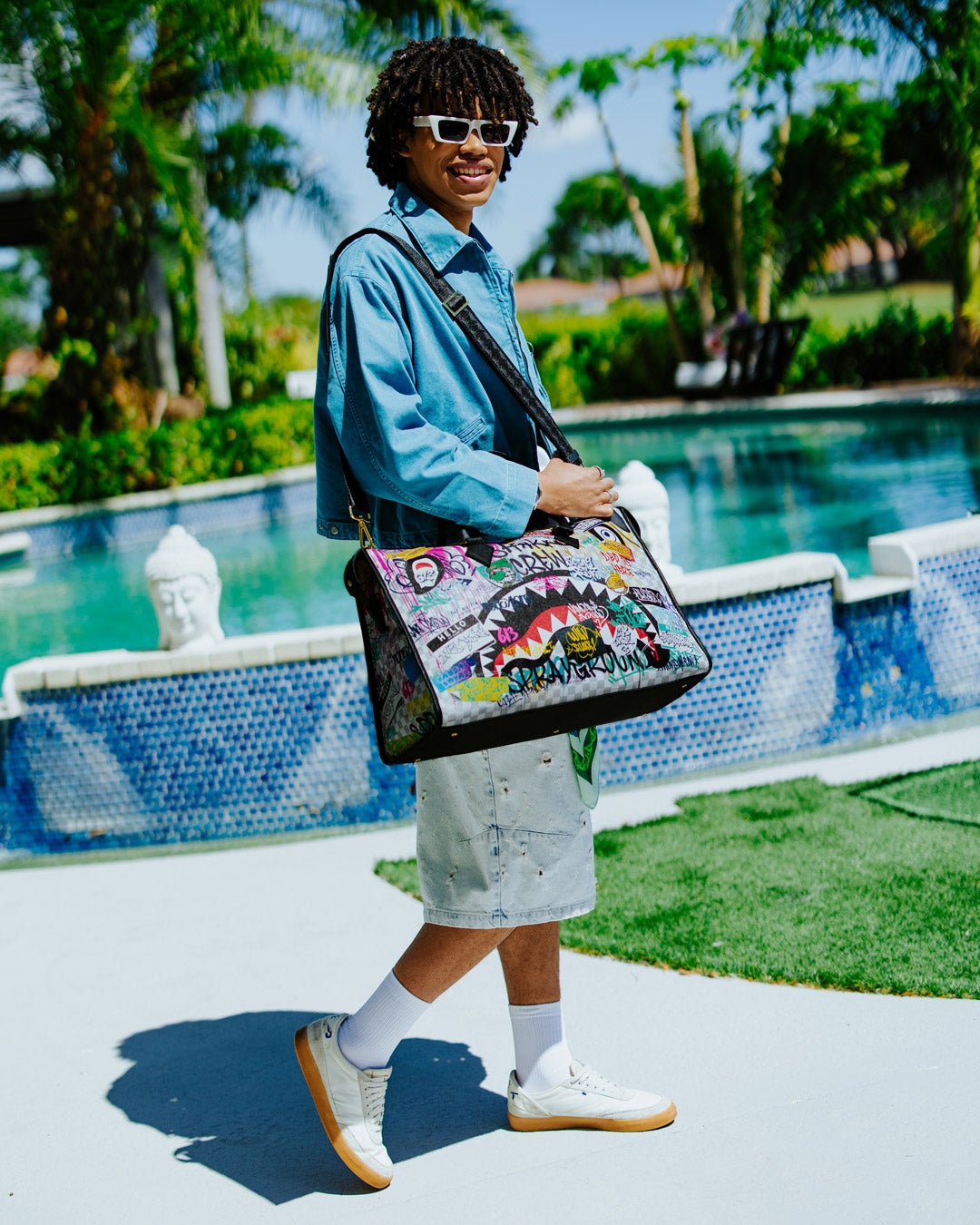 SPRAYGROUND® DUFFLE CREATE ANOTHER DAY PYRAMID DUFFLE