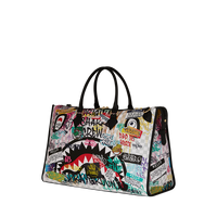 SPRAYGROUND® DUFFLE CREATE ANOTHER DAY PYRAMID DUFFLE