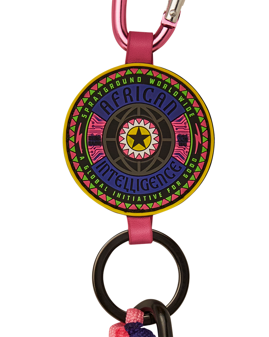 SPRAYGROUND® KEYCHAIN AFRICAN INTELLIGENCE 12 BROOKLYN & BEYOND KEYCHAIN - SANDFLOWER COLLAB